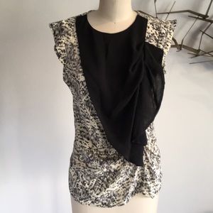 Karen Zambos Black and ivory printed silk blouse.